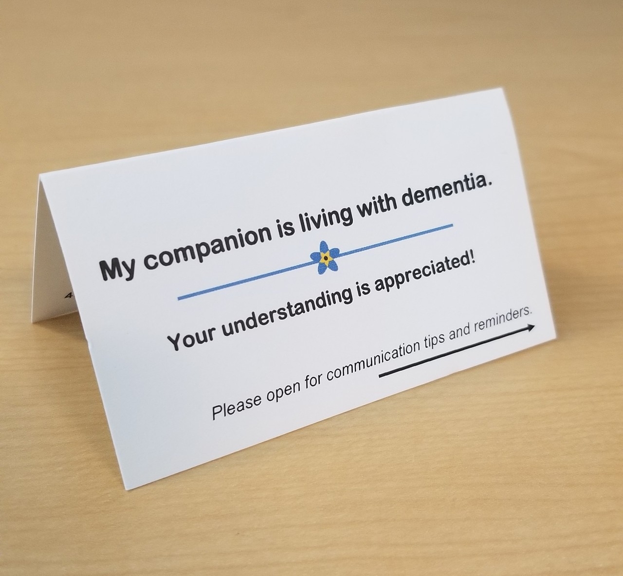 Folded Dementia Communication Card on a table