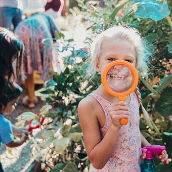 Girl blowing bubbles