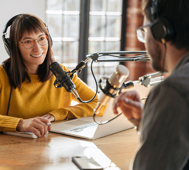 man-and-woman-podcasters-interview-each-other-reduced-cropped