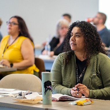 1x1 Learn4Life Trauma-Resilient Education - teacher paying attention at a training