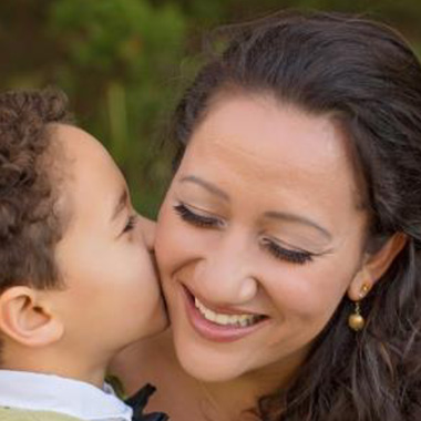 1x1 SBCS Mi Escuelita - mom gets a kiss from her young son