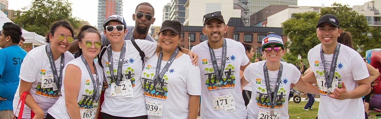 Race finishers wearing medals